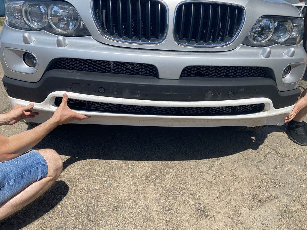Strap on the front bumper poslerestayl (for painting) for BMW X5 E-53 1999-2006 - Reelken Auto