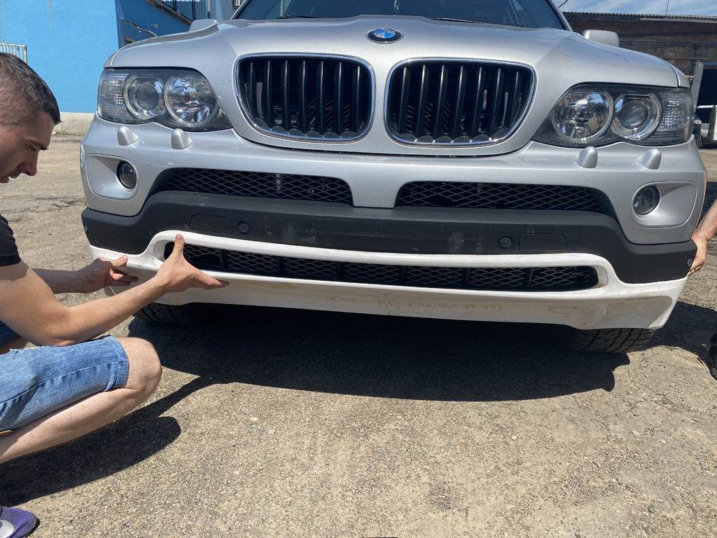 Strap on the front bumper poslerestayl (for painting) for BMW X5 E-53 1999-2006 - Reelken Auto