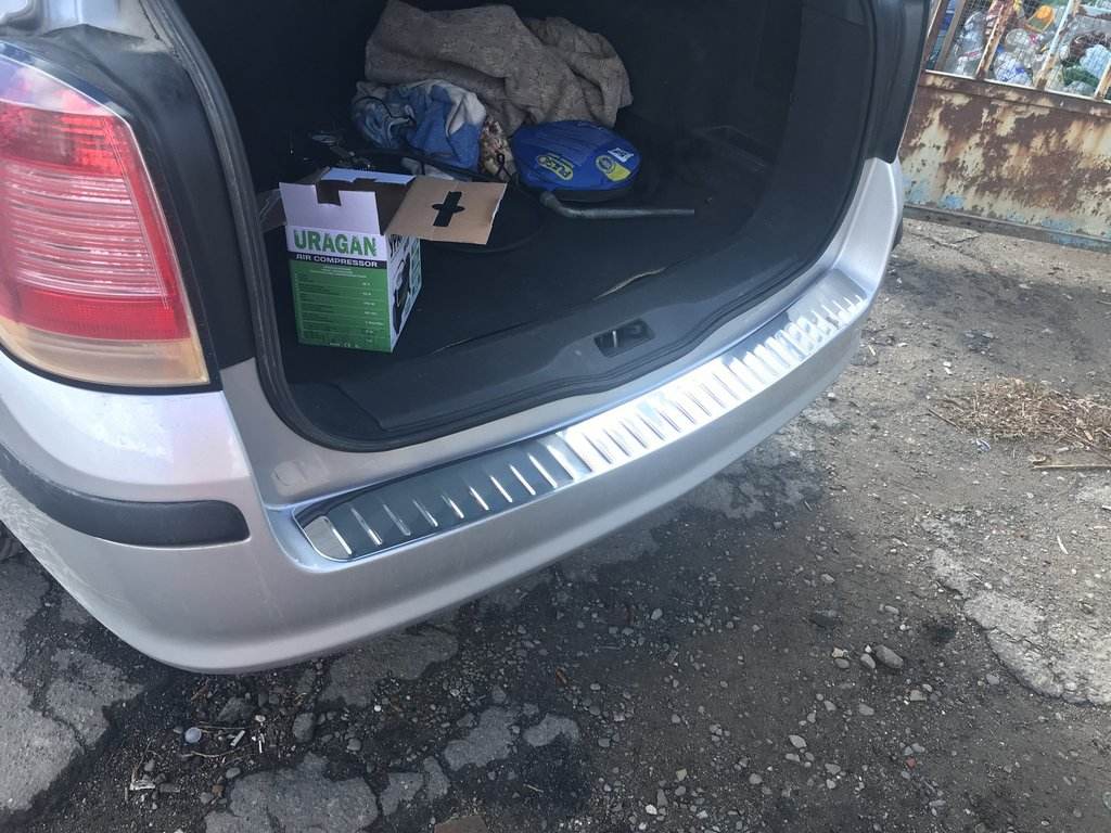 Cover on the rear bumper OmsaLine gloss (SW, stainless steel) for Opel Astra H 2004-2013 - Reelken Auto