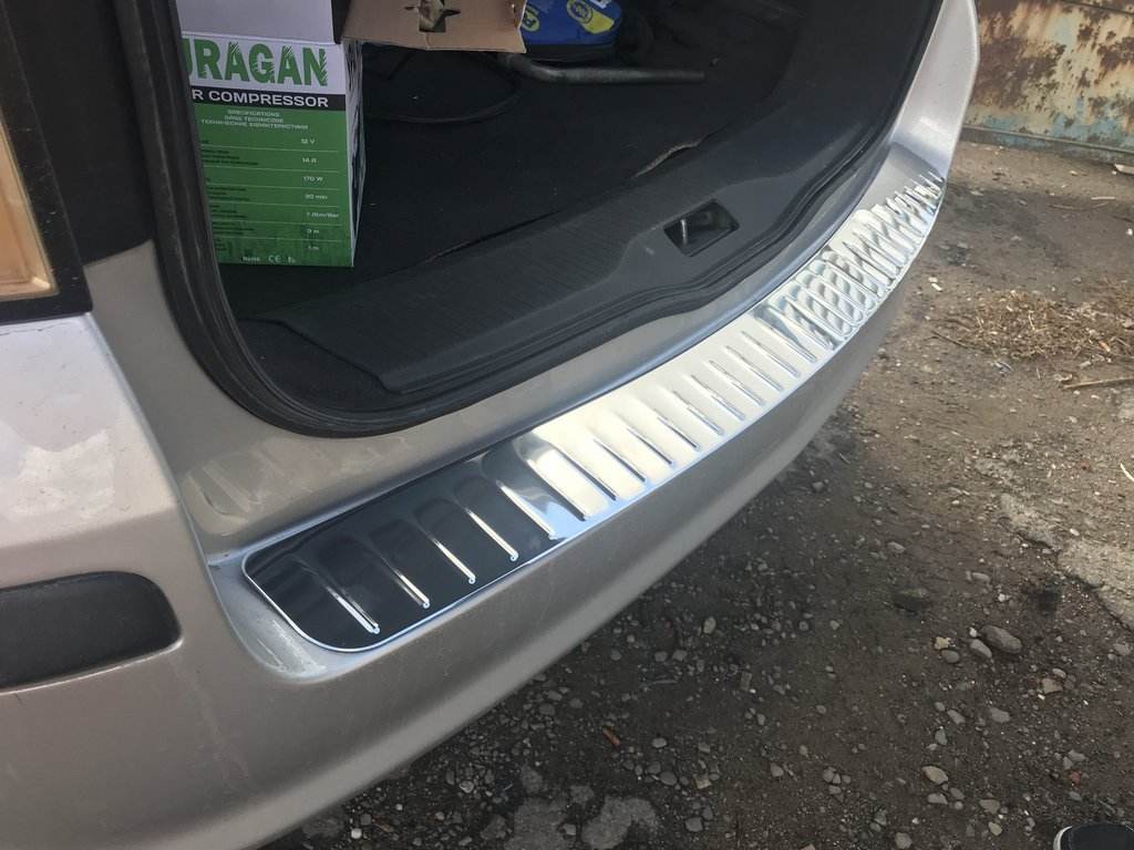 Cover on the rear bumper OmsaLine gloss (SW, stainless steel) for Opel Astra H 2004-2013 - Reelken Auto