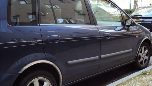 Stainless Steel Fender Trim (4 pcs) for Mazda Premacy 1999-2005 - image 1