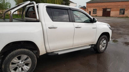 Side sills Allmond Grey (2 pieces, aluminum) for Toyota Hilux 2015↗ - Reelken Auto