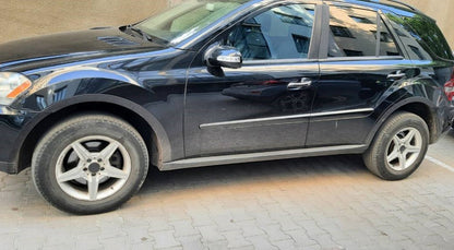 Fender flares (4 pcs, black, ABS plastic) for Mercedes ML W164 2005-2011 - image 1