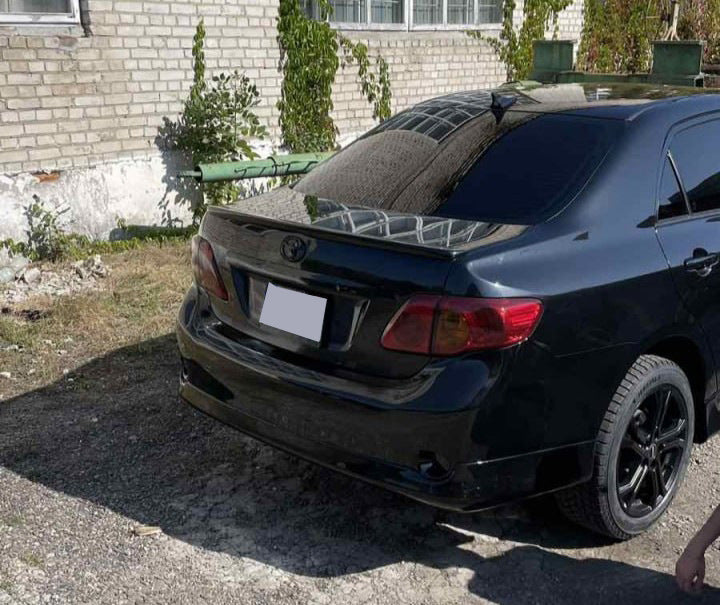 Rear bumper cover (primed for painting) for Toyota Corolla 2007-2013 - image 1