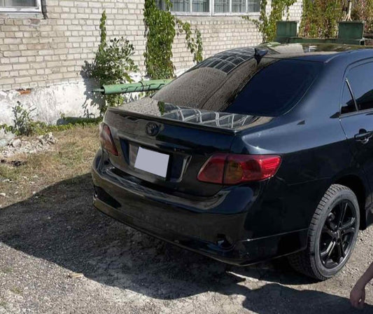 Rear bumper cover (primed for painting) for Toyota Corolla 2007-2013 - image 1