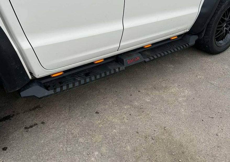 Side sills Dakar V2 with LED (2 pcs, metal) for Volkswagen Amarok 2010-2022 - Reelken Auto