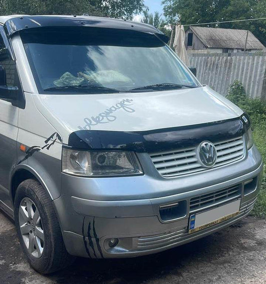 The visor on the windscreen (in brackets) for Volkswagen T5 Caravelle 2004-2010 - Reelken Auto