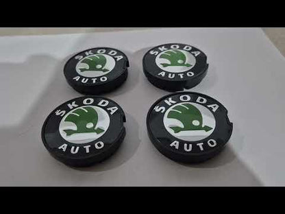 Wheel center caps 56/51mm sk5651 (4 pcs) for Skoda - video 1