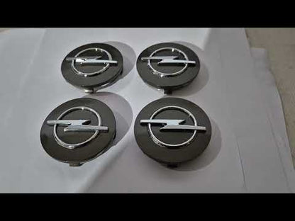 Wheel center caps 64/61mm op6461g (4 pcs) for Opel - video 1