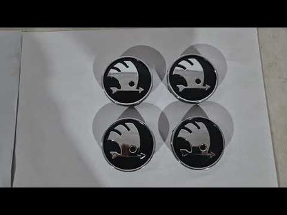 Wheel center caps 60/56mm 9068 (4 pcs) for Skoda - video 1