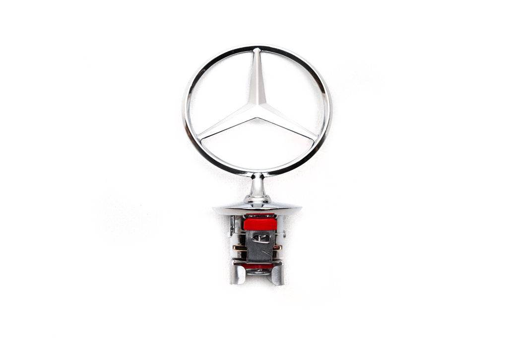 Sight emblem without inscription (for E-class) for Mercedes E-class W124 1984-1997 - Reelken Auto