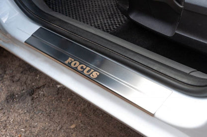 Threshold pads (Carmos, 4 pcs., stainless steel) for Ford Focus II 2005-2008 - Reelken Auto