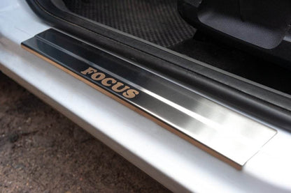 Threshold pads (Carmos, 4 pcs., stainless steel) for Ford Focus II 2008-2011 - Reelken Auto