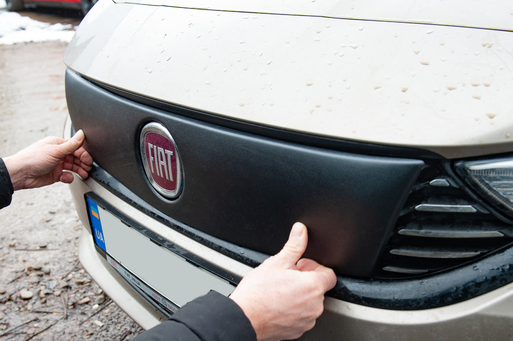Winter cover on the grille for Fiat Tipo 2016↗ year - image 1