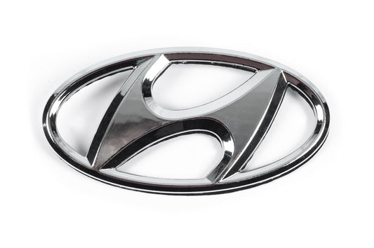 Emblem 86300-1J500 (125 mm x 65 mm) for Hyundai I-20 2008-2012 - image 1