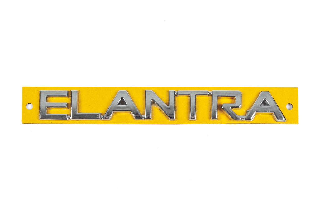 Emblem Elantra 863152D001 (160mm x 20mm) for Hyundai Elantra (XD) 2000-2011 - image 1