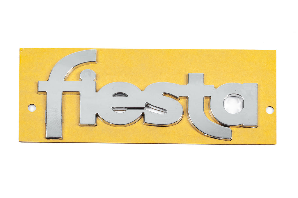 Emblem Fiesta YS61B42528AA (117mm x 52mm) for Ford Fiesta 1995-2001 - image 1