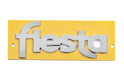 Emblem Fiesta YS61B42528AA (117mm x 52mm) for Ford Fiesta 1995-2001 - image 1